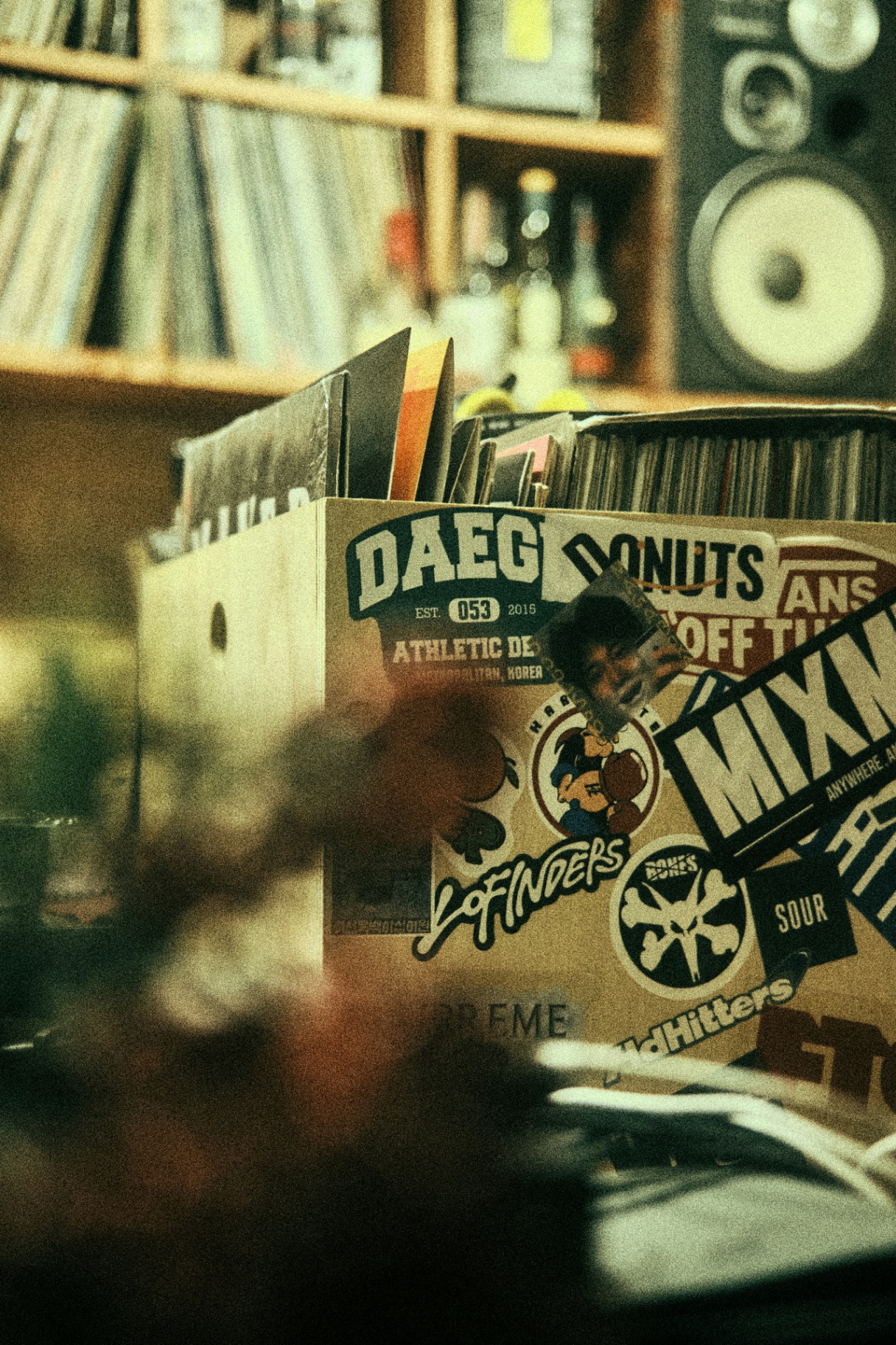 Crates of records with stickers and contact sheets